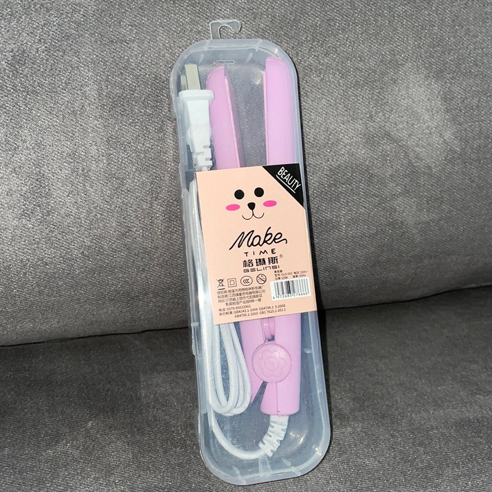 NWT.  Miniature hair straightener.